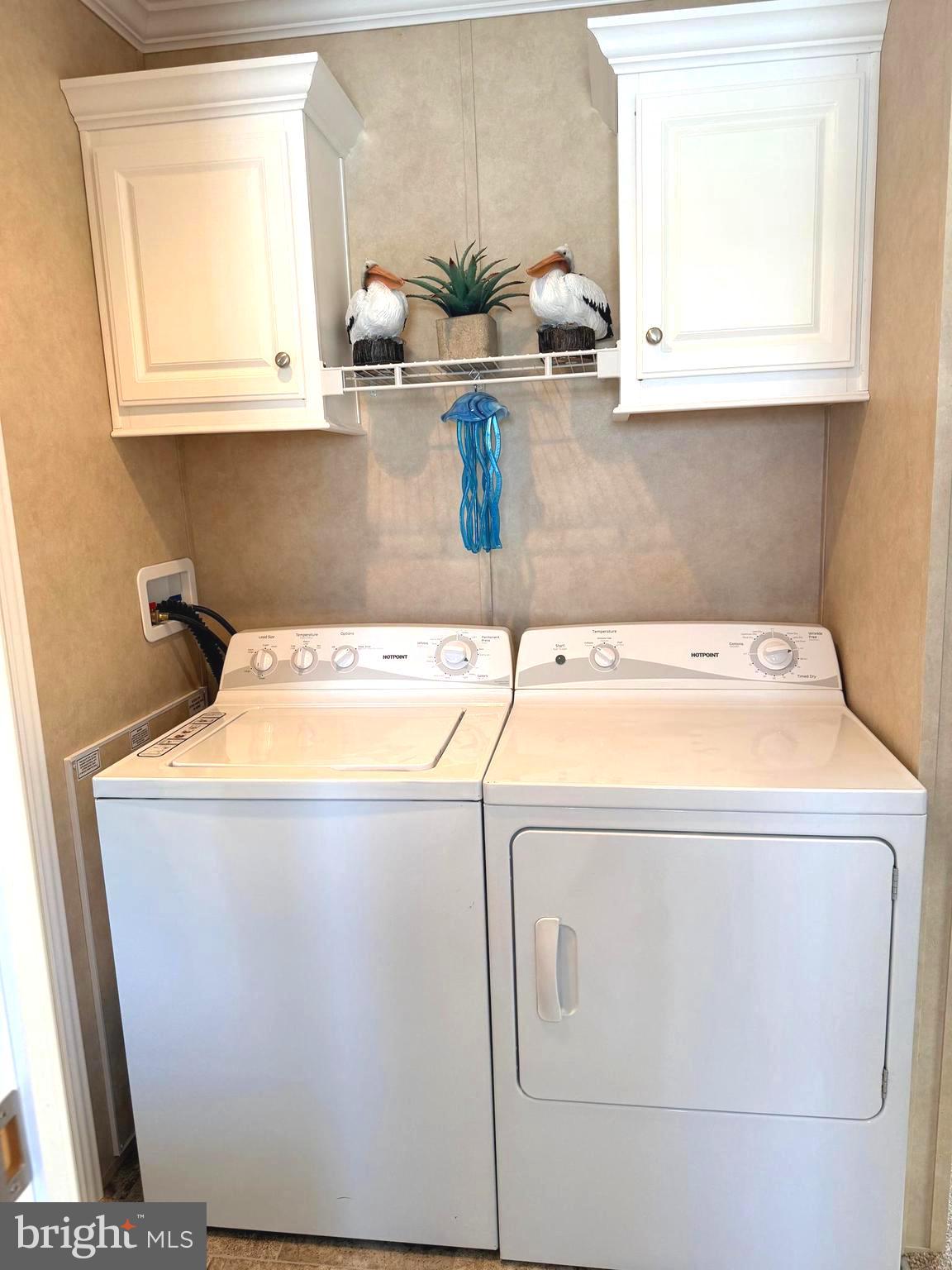 38025 Rabbit Road, Unit 101 Ocean View, DE 19970 - Photo 72 of 112 a utility room with washer and dryer