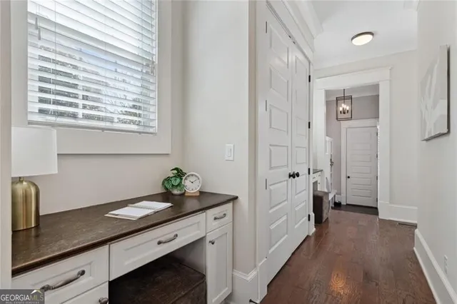 a bathroom with a sink a mirror and a window