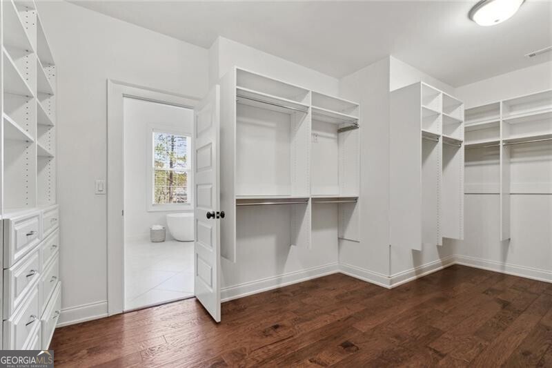 3185 Casteel Road Marietta, GA 30062 - Photo 18 of 20 an empty room with wooden floor