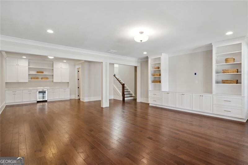 3185 Casteel Road Marietta, GA 30062 - Photo 20 of 20 a view of an empty room with wooden floor and a cabinet
