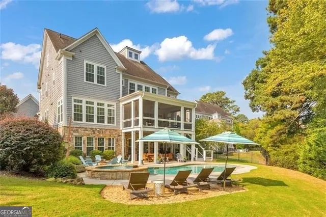 a front view of a house with swimming pool