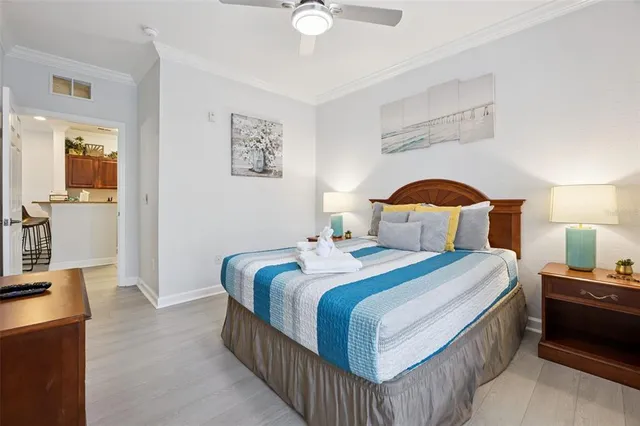 a bedroom with two beds and a window