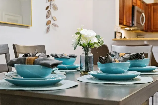 an aerial view of a house with a lake view