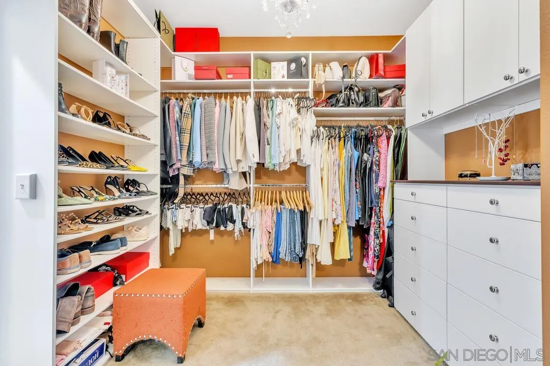 14622 Whispering Ridge Road San Diego, CA 92131 - Photo 43 of 75 a view of a storage with an empty shelves