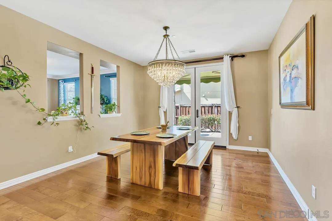 14622 Whispering Ridge Road San Diego, CA 92131 - Photo 7 of 75 a view of a livingroom with furniture window and wooden floor