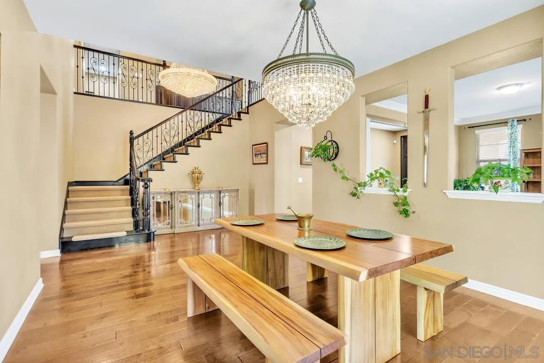 14622 Whispering Ridge Road San Diego, CA 92131 - Photo 8 of 75 a view of a dining room with furniture