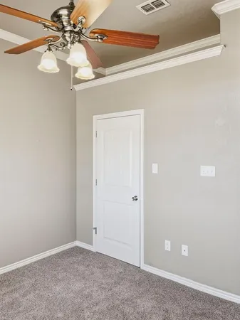 a bathroom with a shower a toilet and a sink