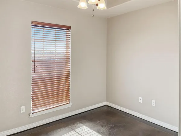 a view of a hallway with entryway and stairs