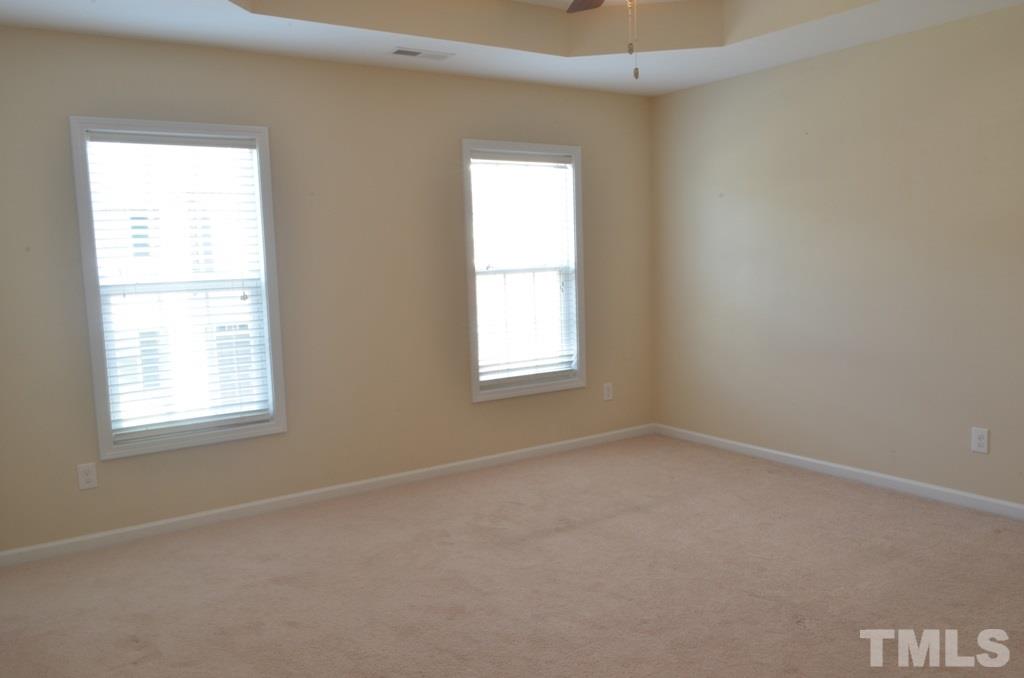 509 Dragby Lane Raleigh, NC 27603 - Photo 14 of 25 an empty room with a window