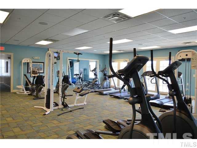 509 Dragby Lane Raleigh, NC 27603 - Photo 24 of 25 a view of a room with gym equipment