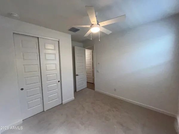 an empty room with closet