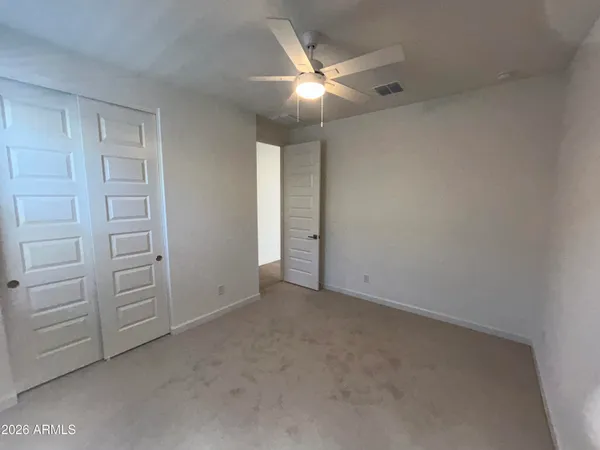 an empty room with closet