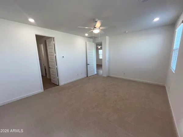 an empty room with a bathroom