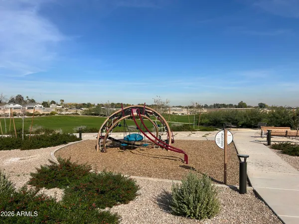 a view of a lake with a yard