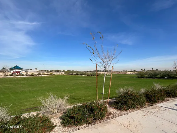 a view of a lake with a big yard