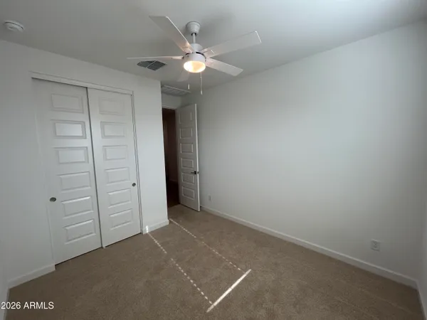 an empty room with closet