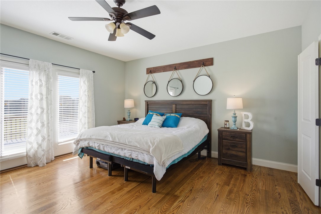 426 Oak Creek Road Seneca, SC 29678 - Photo 16 of 50 This airy room features hardwood flooring and abundant natural light, offering a comfortable personal retreat.