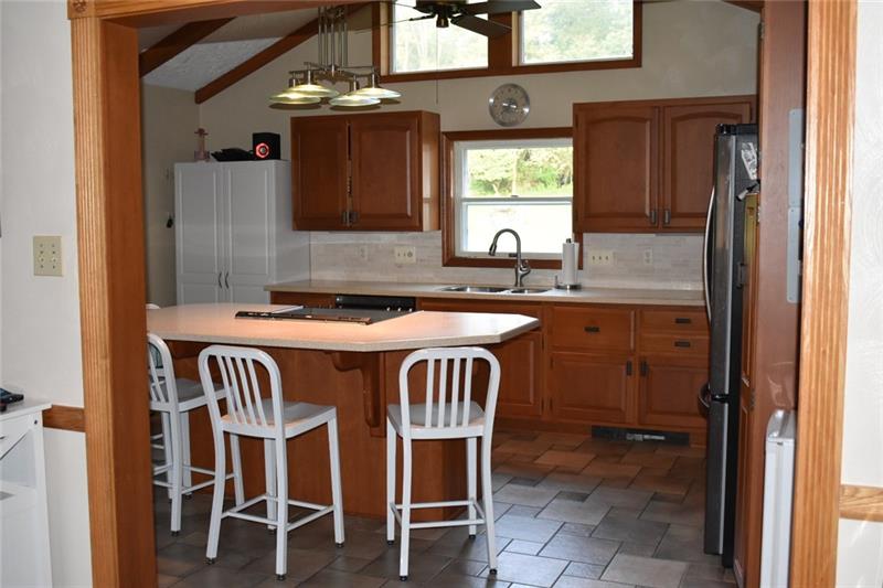 181 Baumgardner Road Salix, PA 15952 - Photo 6 of 24 Updated eat-in kitchen with Corian counters and tile floor.