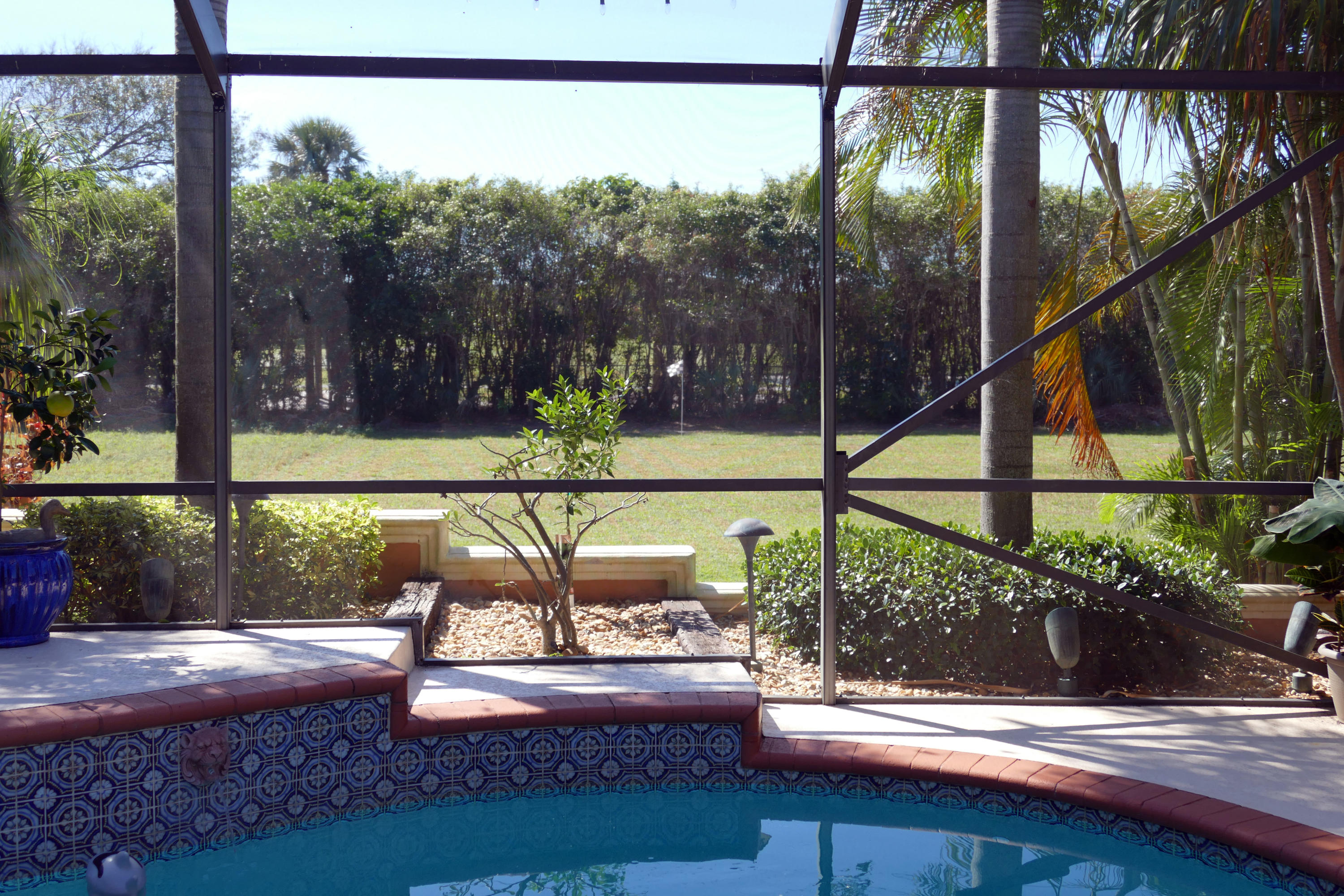 4680 Brandywine Drive Boca Raton, FL 33487 - Photo 30 of 40 Back Yard View & Golf Flag