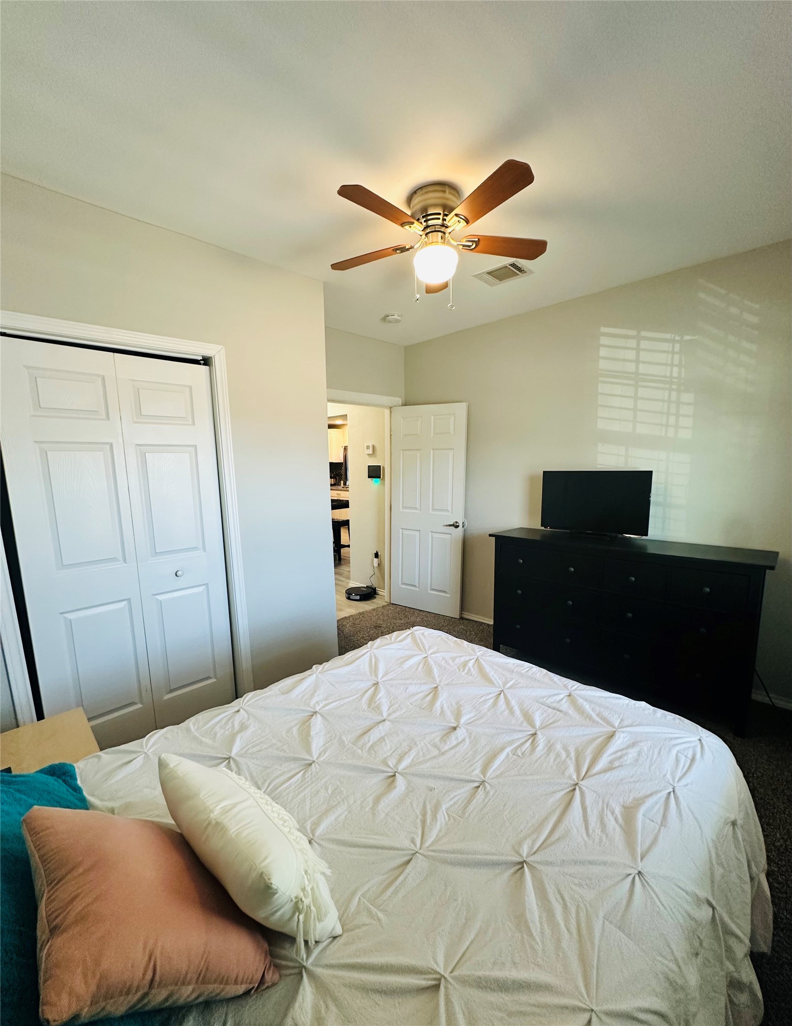 323 North Outlar Street Wharton, TX 77488 - Photo 15 of 25 a bedroom with a bed and a closet