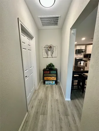 a room with gym equipment and a mirror