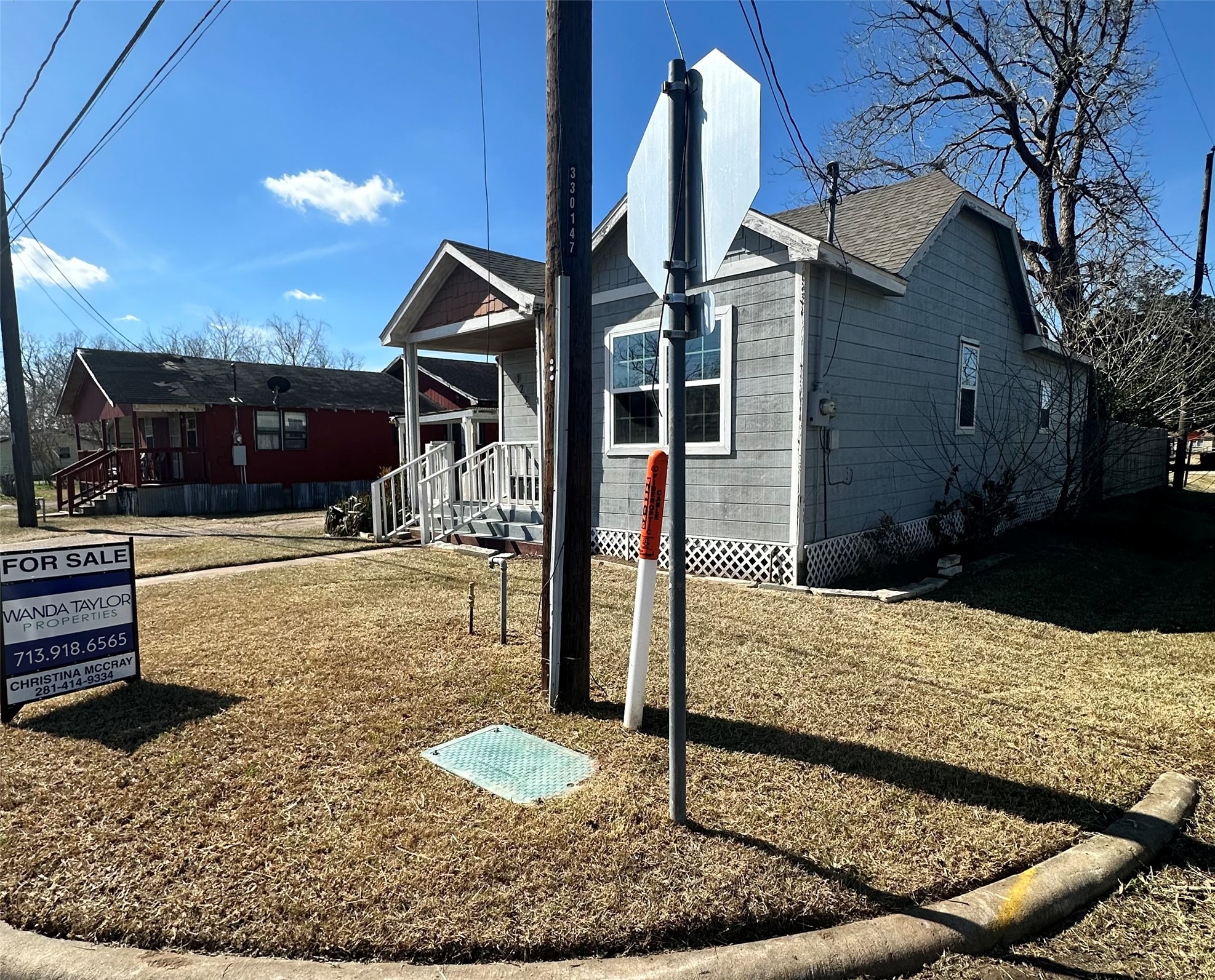 323 North Outlar Street Wharton, TX 77488 - Photo 3 of 25 a front view of a house with garden