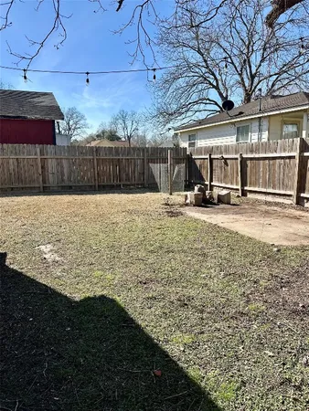 a view of backyard of house