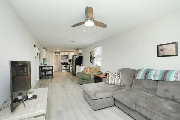 a kitchen with a table and chairs in it