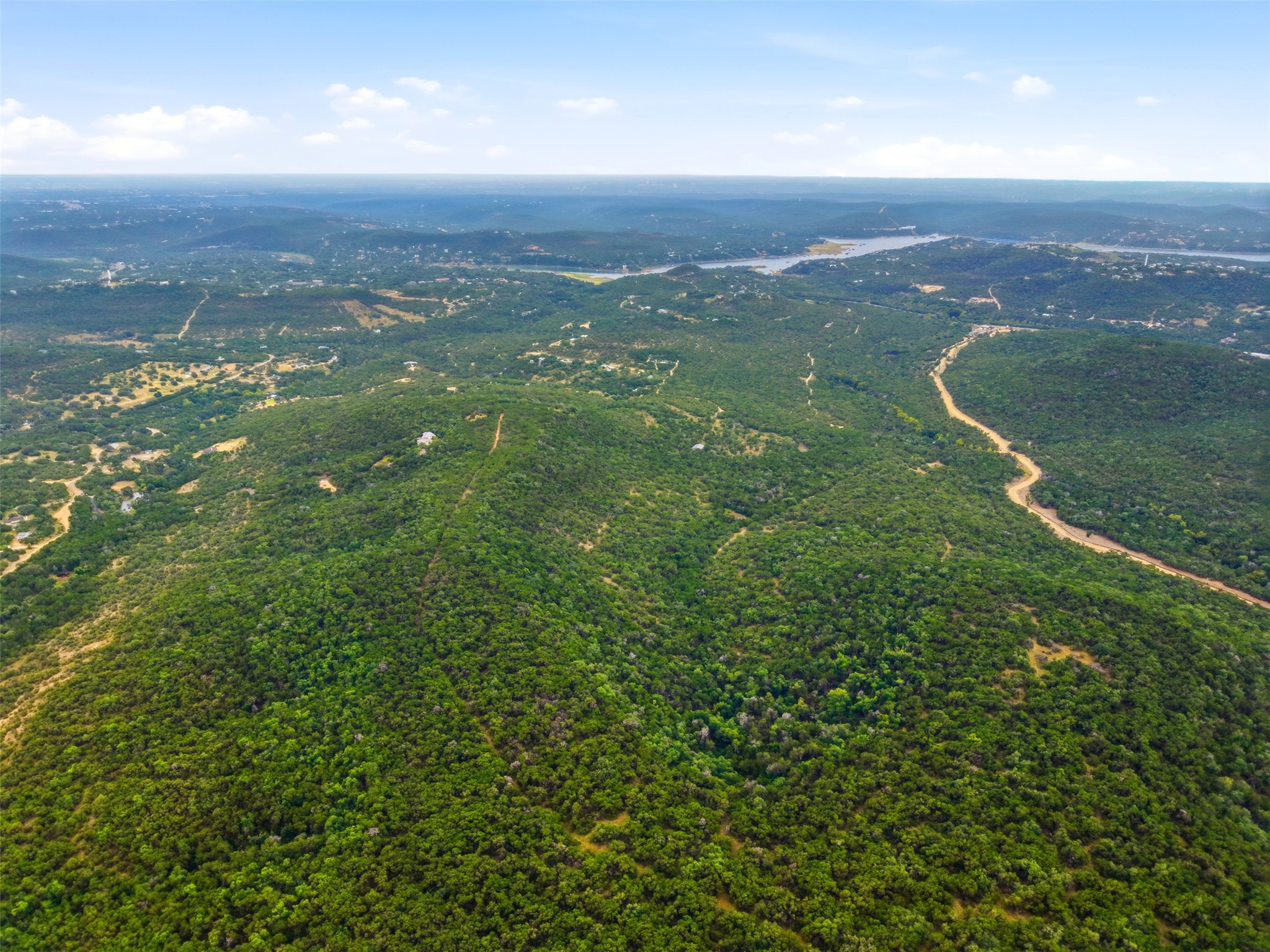 Tbd Vance Circle Road Leander, TX 78645 - Photo 11 of 33 Rolling green hills and distant water views define this expansive natural landscape.