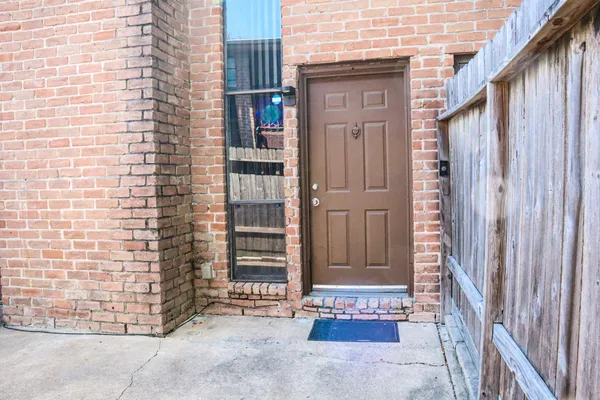 a view of outdoor space and front door