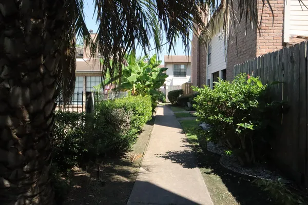 a view of a backyard of a house