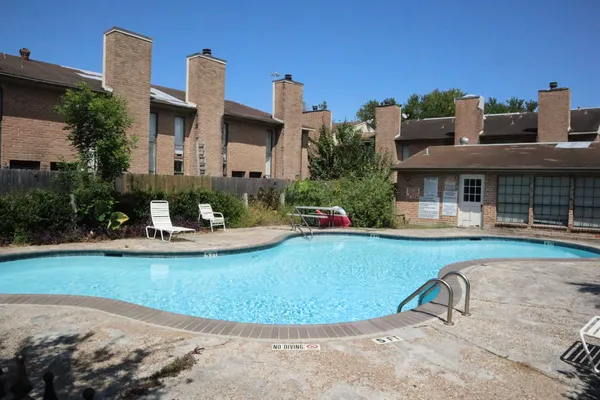 a view of a house with a swimming pool