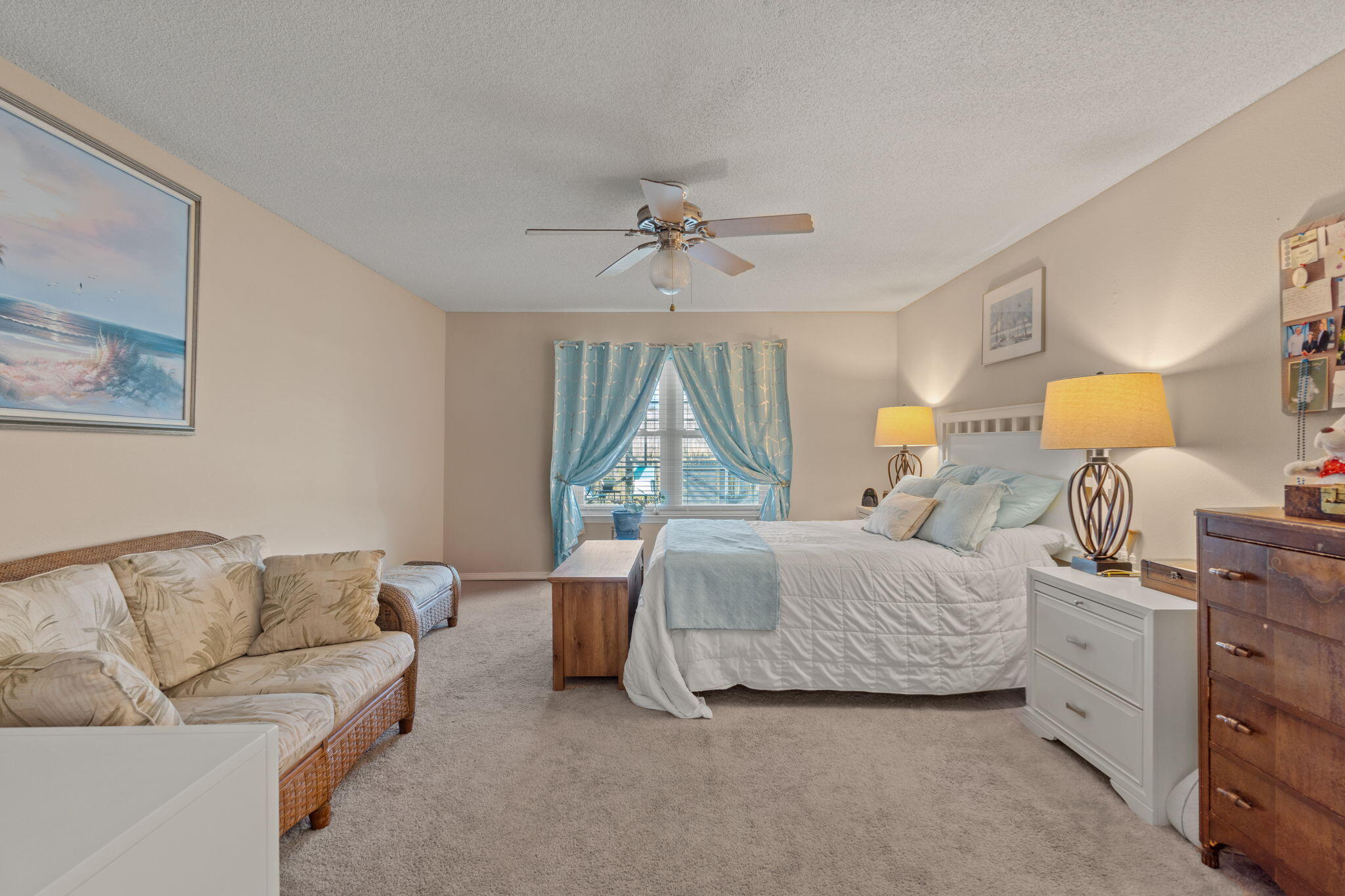 2121 Ortega Street Navarre, FL 32566 - Photo 18 of 47 a living room with a bed furniture and a window