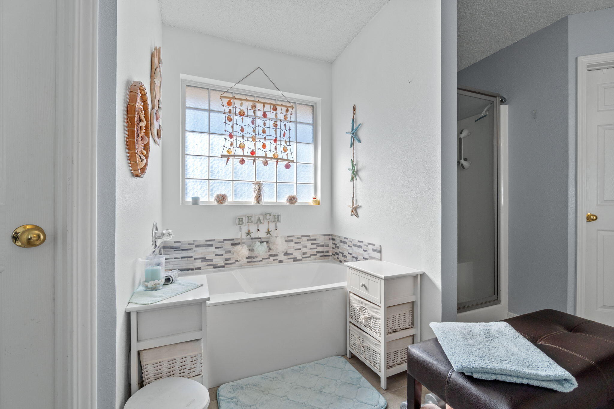 2121 Ortega Street Navarre, FL 32566 - Photo 22 of 47 a bathroom with a sink toilet and shower