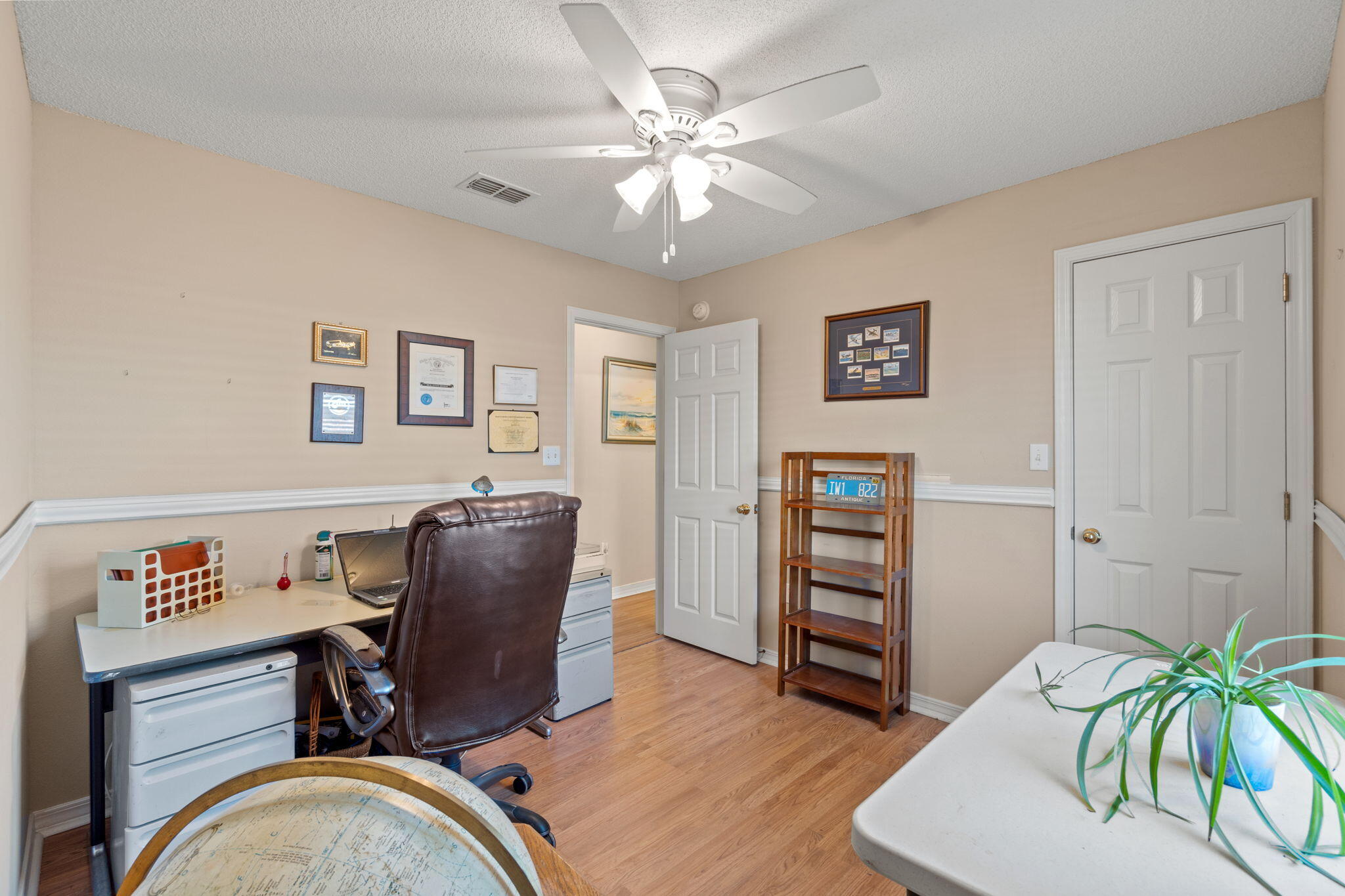 2121 Ortega Street Navarre, FL 32566 - Photo 28 of 47 a view of a workspace with furniture and staircase