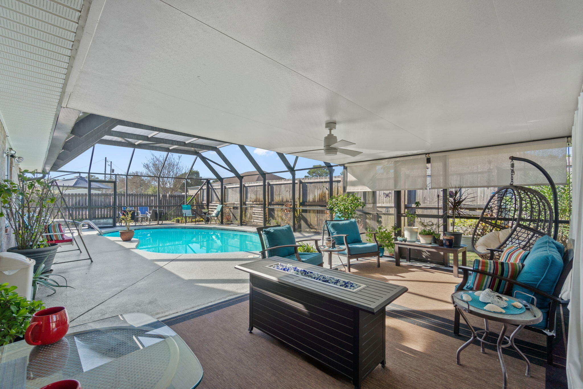 2121 Ortega Street Navarre, FL 32566 - Photo 35 of 47 a living room with a couch and chairs