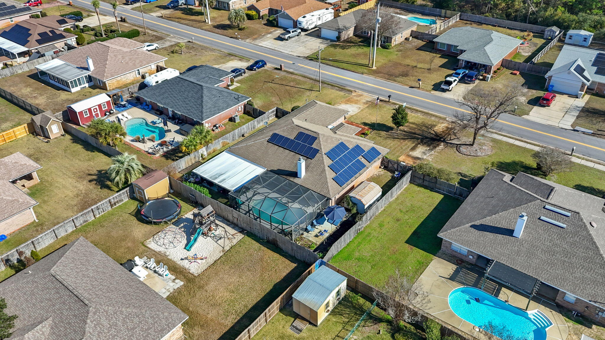 2121 Ortega Street Navarre, FL 32566 - Photo 40 of 47 an aerial view of a house with a ocean view