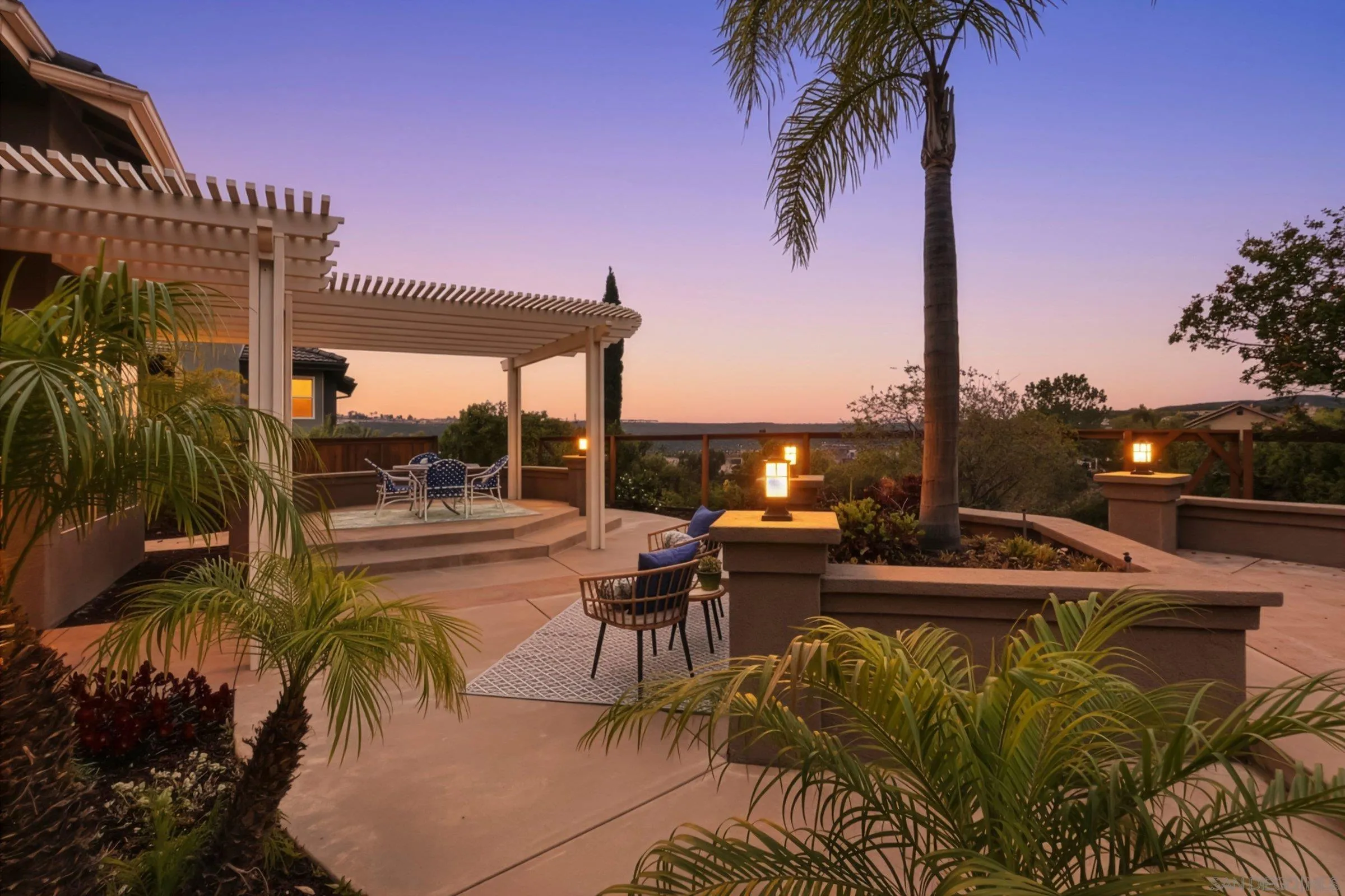 12182 Mannix Road San Diego, CA 92129 - Photo 2 of 43 a view of a patio with swimming pool