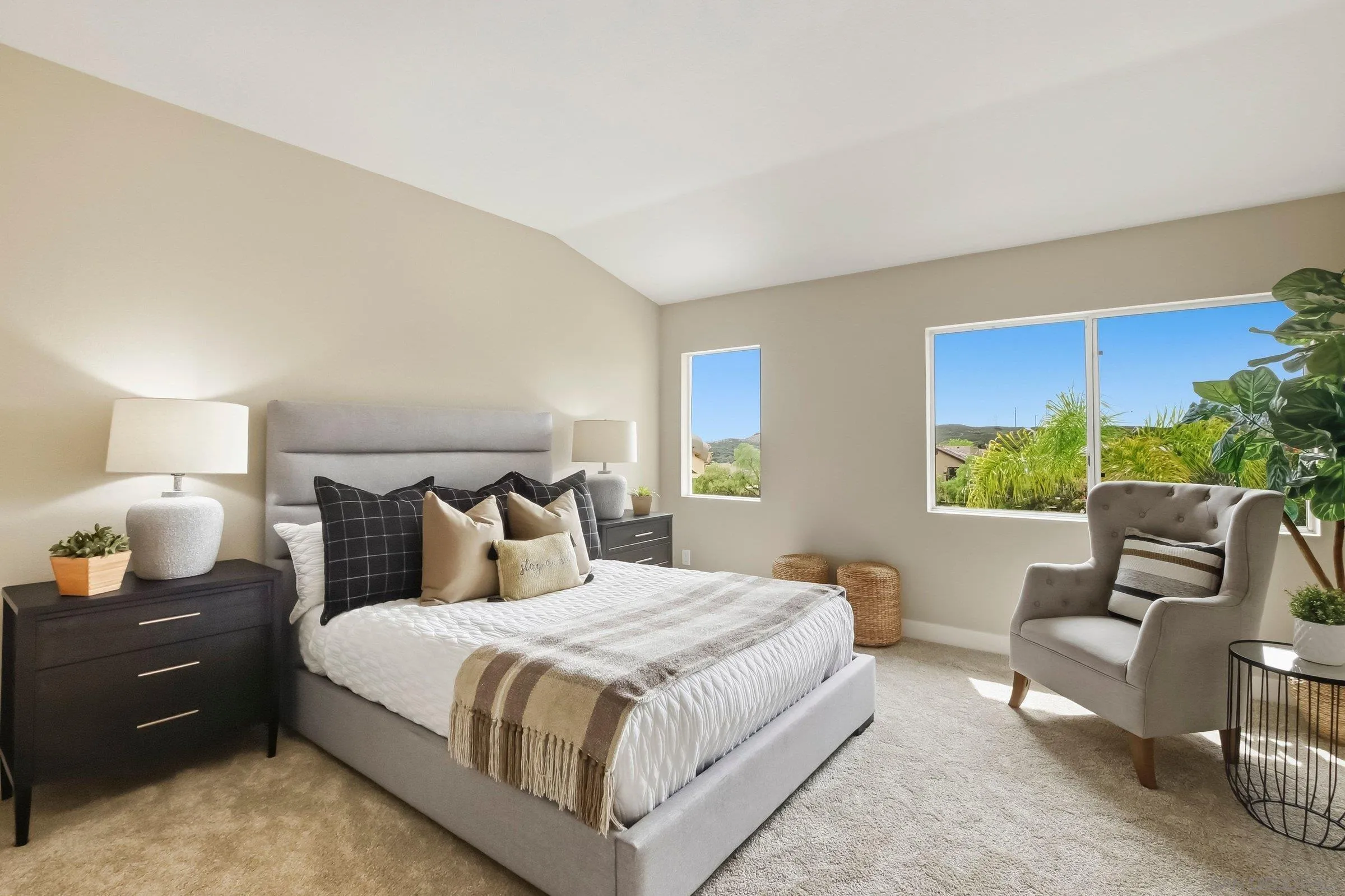 12182 Mannix Road San Diego, CA 92129 - Photo 22 of 43 a bedroom with a bed and a couch