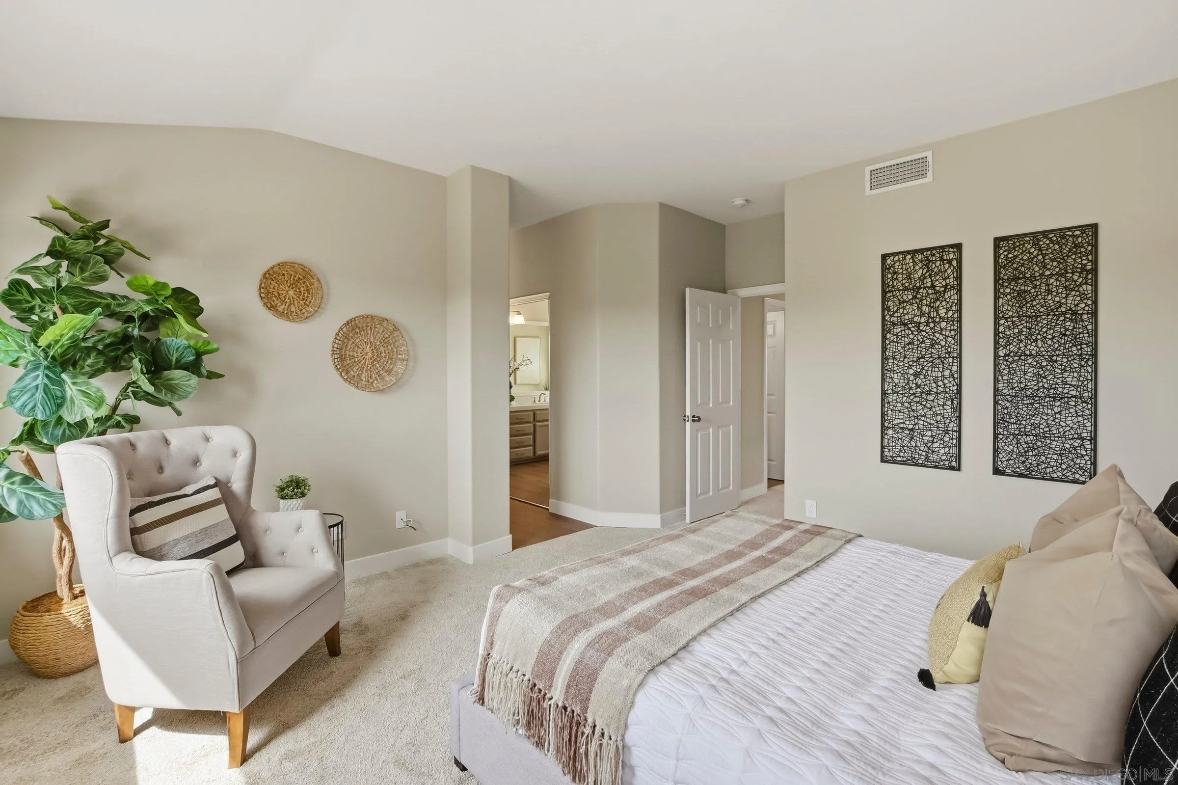 12182 Mannix Road San Diego, CA 92129 - Photo 24 of 43 a bedroom with a bed and a couch