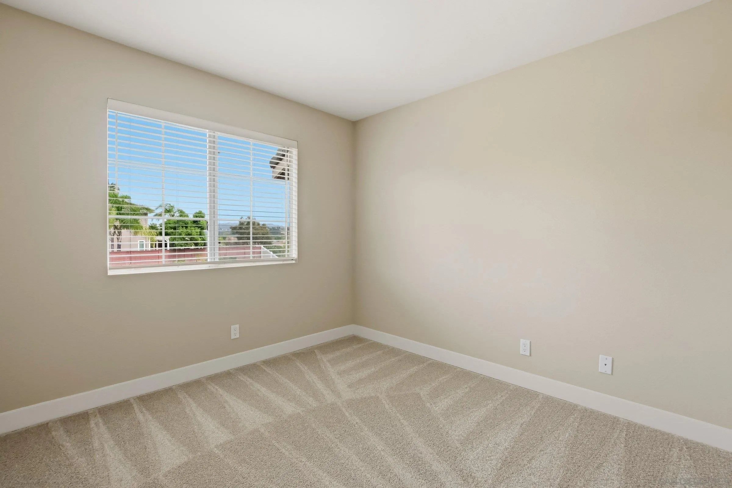 12182 Mannix Road San Diego, CA 92129 - Photo 27 of 43 an empty room with a window