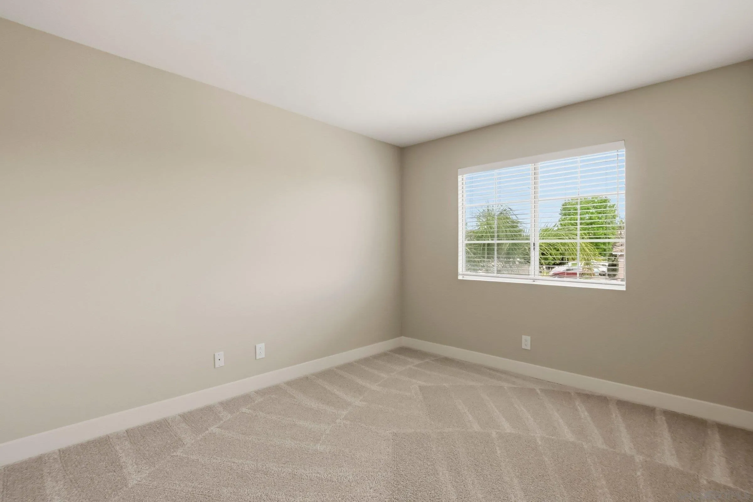 12182 Mannix Road San Diego, CA 92129 - Photo 29 of 43 an empty room with windows