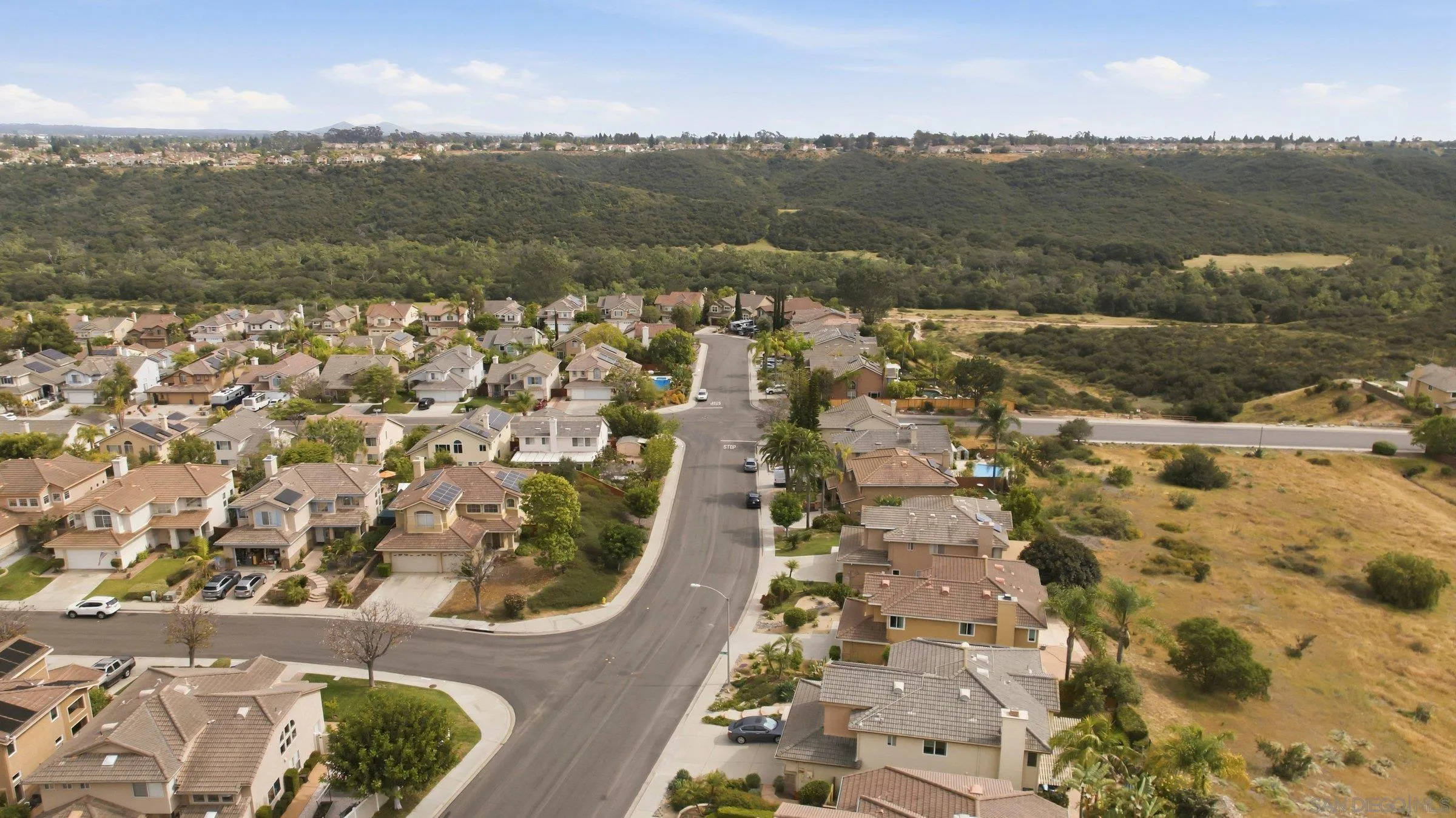 12182 Mannix Road San Diego, CA 92129 - Photo 42 of 43 an aerial view of residential houses with outdoor space