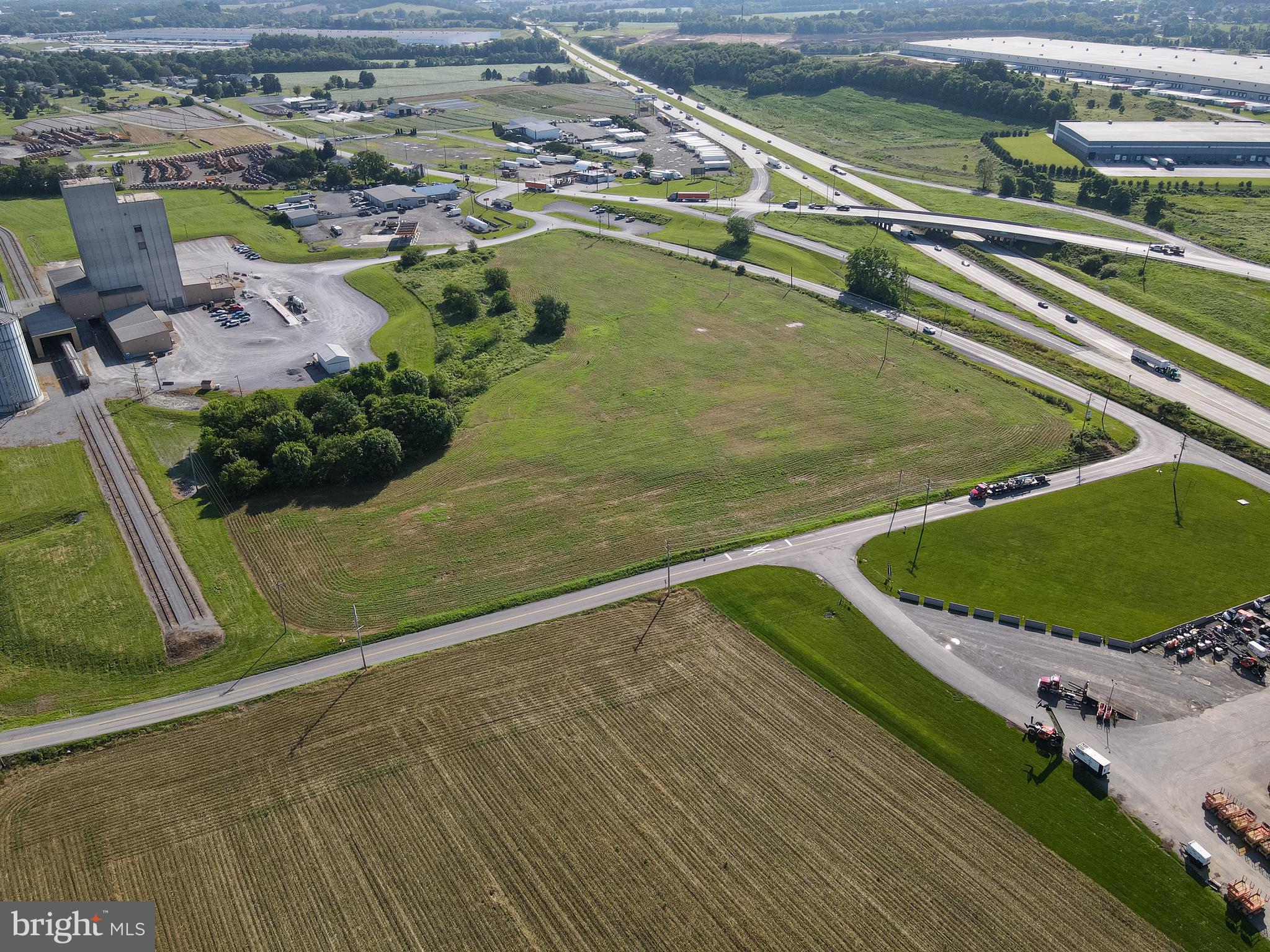 a view of a swimming pool with a yard