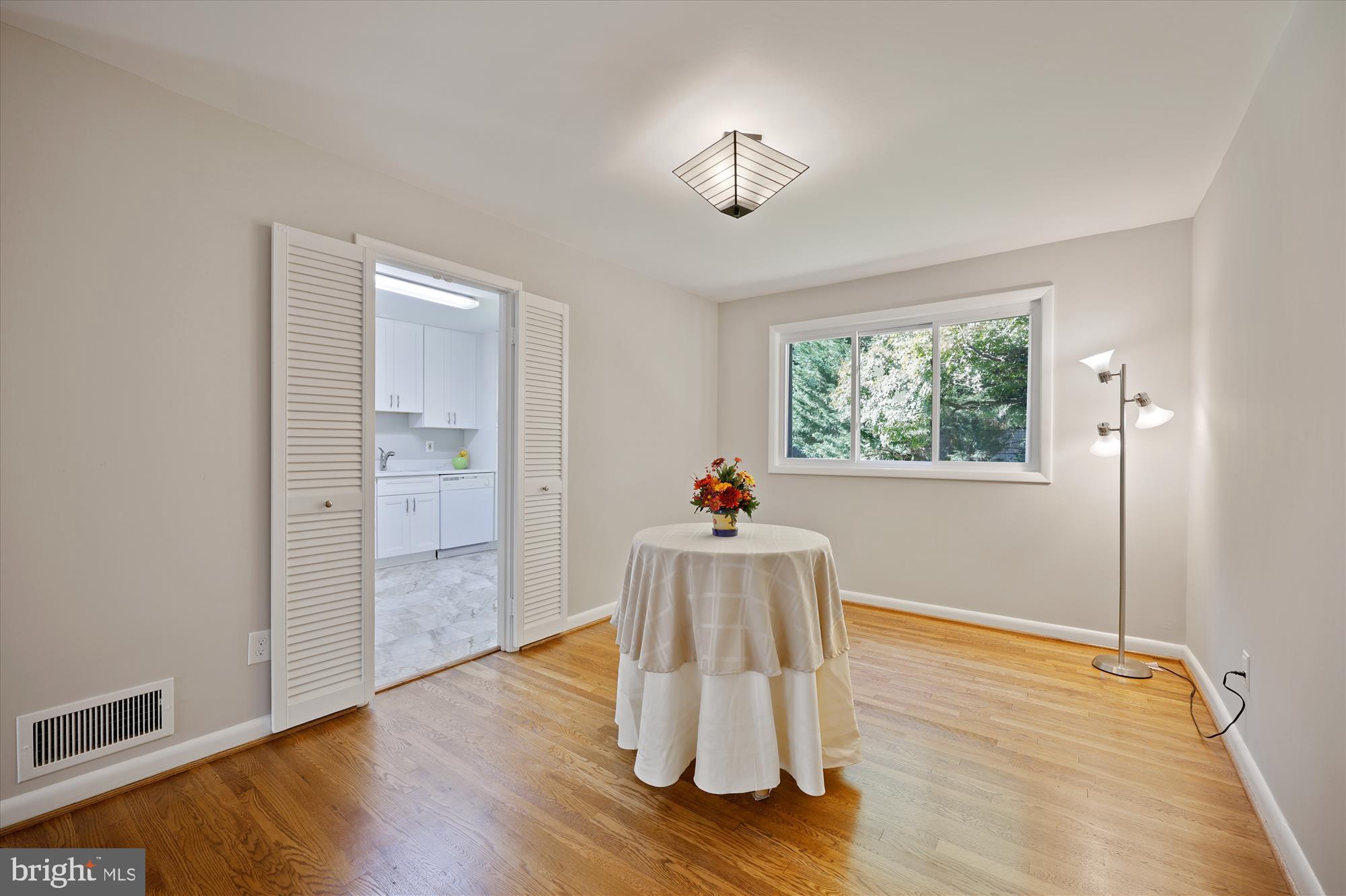 9708 Belvedere Place Silver Spring, MD 20910 - Photo 6 of 40 Dining Room, louvered French doors to Kitchen