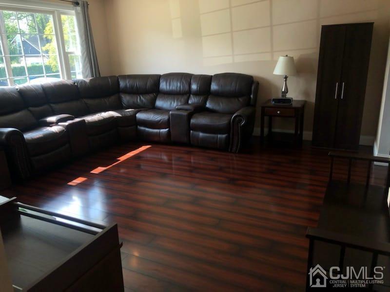 9 Richmond Road Edison, NJ 08817 - Photo 5 of 15 a living room with furniture and wooden floor