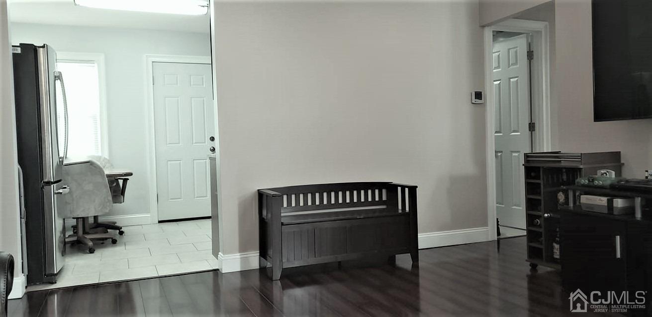 9 Richmond Road Edison, NJ 08817 - Photo 6 of 15 a room with wooden floor and furniture