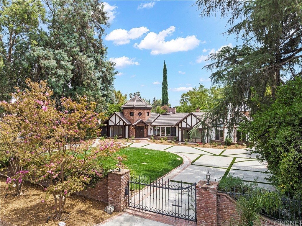17220 Gresham Street Northridge, CA 91325 - Photo 3 of 57 a view of a patio with couches table and chairs and potted plants