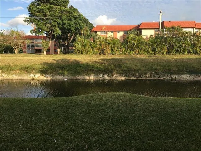a view of a lake from a yard