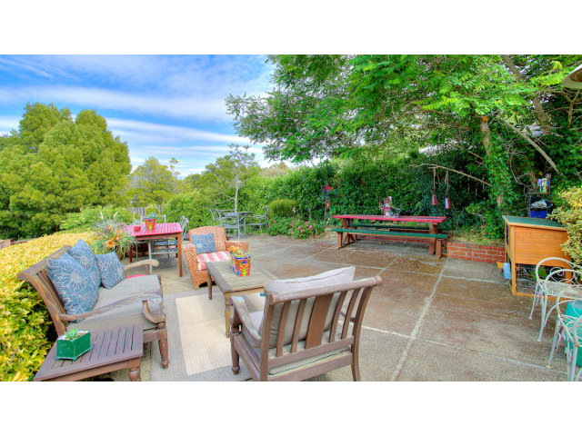 3 Spring Valley Lane Millbrae, CA 94030 - Photo 15 of 16 a patio with table and chairs